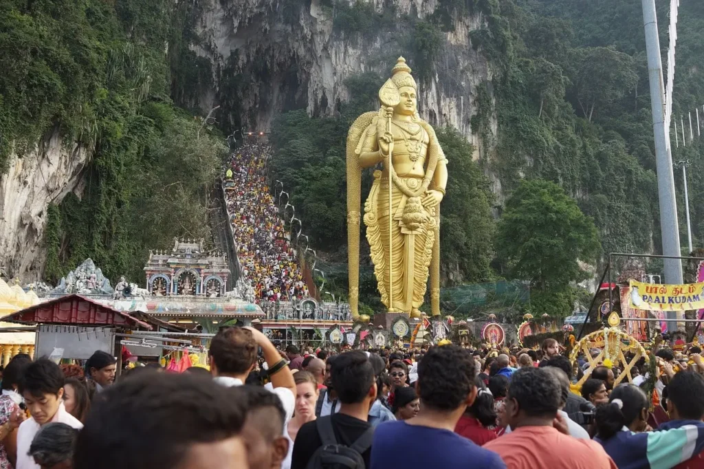 unique traditional events

odd global festivals

weird traditions from different countries Devotees gather at Batu Caves during Thaipusam festival in front of the massive golden Murugan statue. A massive crowd of devotees gathers at the iconic Batu Caves in Malaysia to celebrate the Thaipusam festival, a vibrant Hindu event dedicated to Lord Murugan. Dominating the scene is a towering golden statue of Lord Murugan—the world’s tallest of its kind—standing at the entrance to the steep staircase leading to the limestone cave temples above. Devotees dressed in colorful attire can be seen ascending the 272 steps, many carrying offerings or performing acts of devotion. The atmosphere is electric with spiritual fervor, cultural expression, and traditional rituals. This powerful image captures the scale, devotion, and cultural richness of one of the world’s most unique and visually striking religious festivals.

