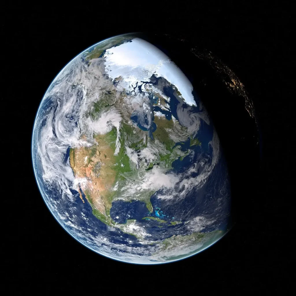 High-resolution image of Earth from space showing clouds, continents, and oceans, symbolizing NASA ISRO NISAR satellite mission to monitor global climate change, environmental sustainability, and natural hazards